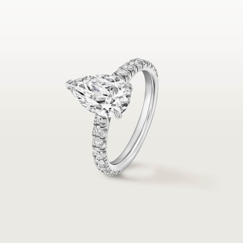 1895钻石戒指，镶嵌梨形切割钻石，铺镶钻石  铂金