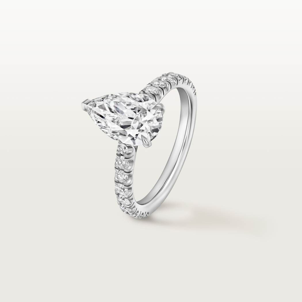 1895钻石戒指，镶嵌梨形切割钻石，铺镶钻石  铂金