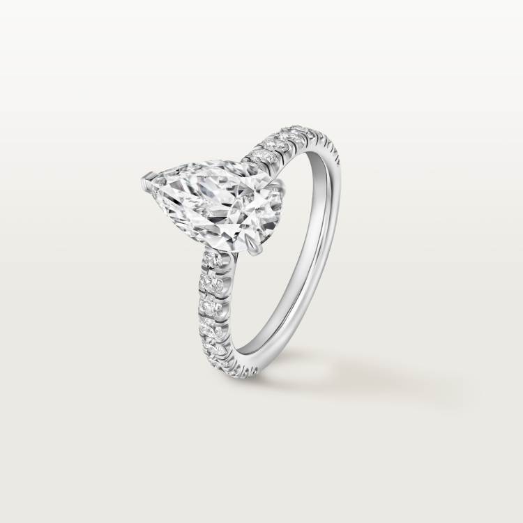 1895钻石戒指，镶嵌梨形切割钻石，铺镶钻石  铂金