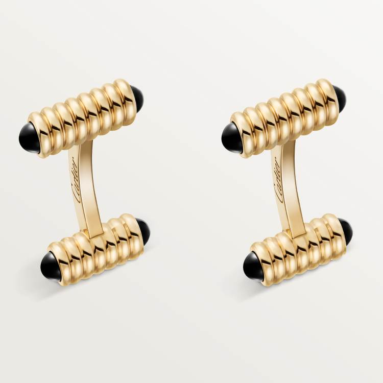 袖扣，呈弹簧造型